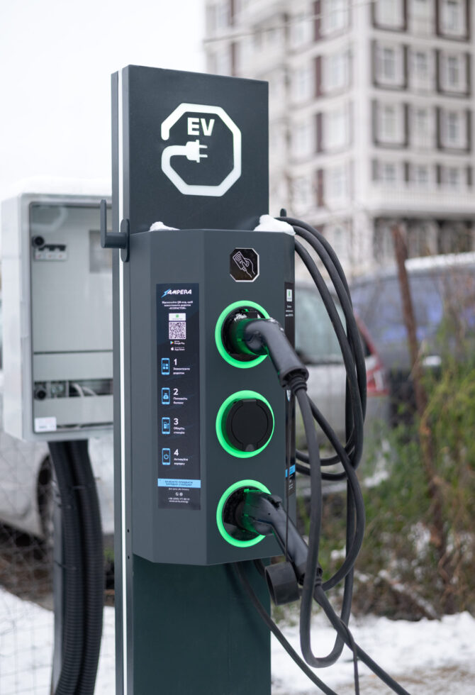 public-charging-station-electric-vehicles-car-parking-lot-closeup